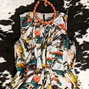 Graphic Sheer Peplum Top